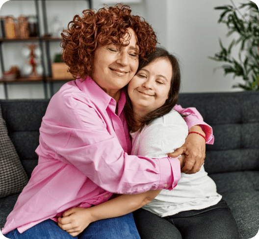 Mother with daughter with disability hugging