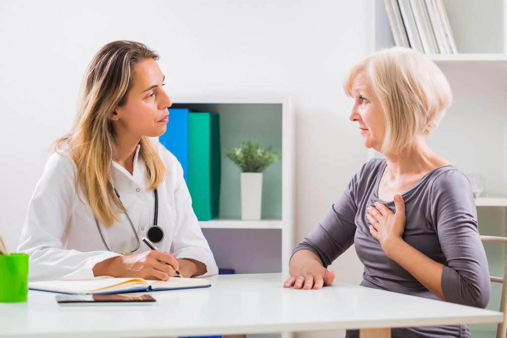 Woman talking to healthcare professional